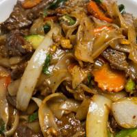 Drunken Noodles · spice.Wide rice noodles with egg, bell peppers, onions, green beans, carrots, zucchini, and ...