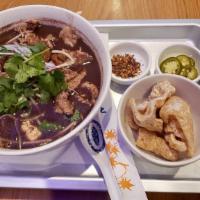 Kuay Tiew Rua (Thai Boat Noodles) · Thailand's most famous street noodles soup. Try our homemade authentic broth with beef, scal...