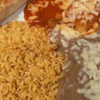 Enchiladas Supreme · Two enchiladas, one beef and one chicken, topped with cream salad with rice or beans.