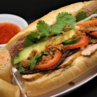 Banh Mi · A classic Vietnamese sandwich. Chá chien, your choice of sauteed pork or beef, pickled carro...