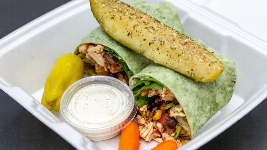 Grilled Chicken Santa Fe Wrap · Grilled chicken, black beans, corn, tomato, spinach, shredded cheese & cucumber ranch dressing.