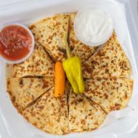 Turkey Quesadilla · Grilled chicken, mixed bell peppers, & shredded cheese.