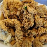 Seafood Platter · All three seafood delicacies: shrimp, oyster and catfish. Served with fries, Texas toast and...