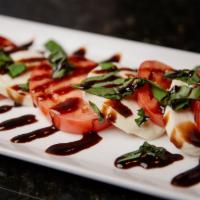 Caprese · Fresh mozzarella, roma tomatoes and fresh basil with extra virgin olive oil and balsamic red...