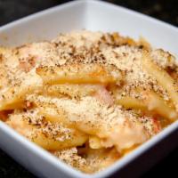 Lobster Mac N' Cheese · North Atlantic lobster, penne pasta and creamy fontina cheese sauce with a panko parmesan cr...