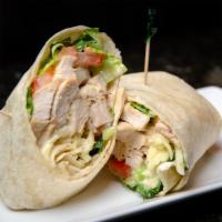 Chicken Wrap · Grilled chicken, lettuce, tomatoes and cheese your choice of caesar or buffalo sauce.
