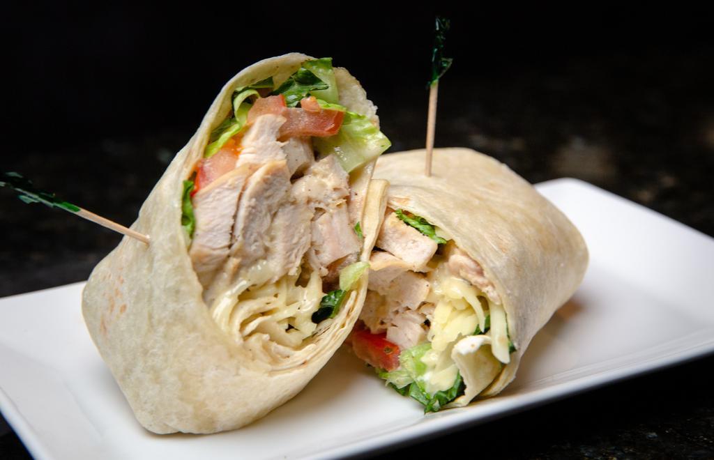 Chicken Wrap · Grilled chicken, lettuce, tomatoes and cheese your choice of caesar or buffalo sauce.