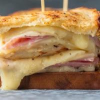 Chicken Cordon Bleu Sandwich · Sourdough bread spread with dijon mustard filled with carved ham, Swiss cheese and roasted c...