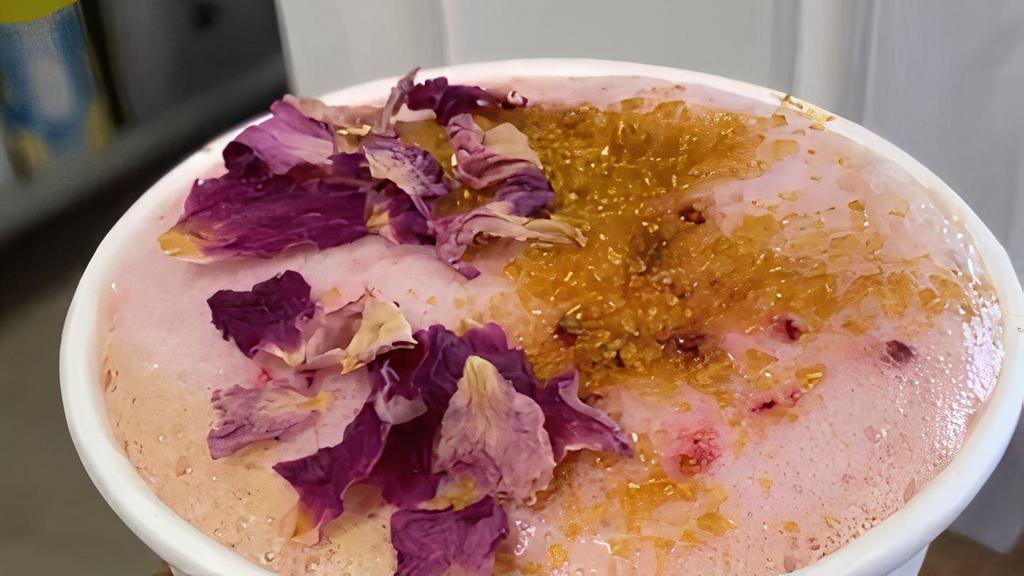 Rose Gold Latte · A classic latte with hints of sweet rose, topped with edible gold and rose petals.