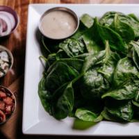 Young Spinach Salad · Baby spinach, blue cheese, red onions, sliced apples, uncured bacon, toasted pecans with a m...
