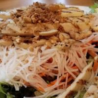 Grilled Vietnamese Lemongrass Chicken Rice Noodle Salad · Fresh Mixed Greens, Cold Vermicelli, Cilantro, Fried Garlic Scallions, Peanuts, Nuoc Cham fi...