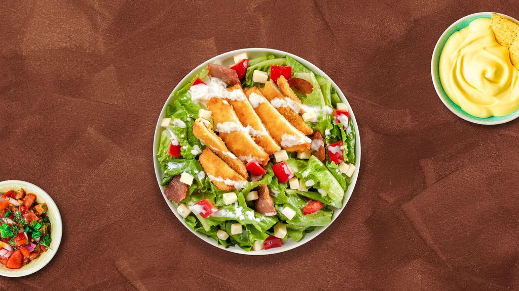 Cajun Chicken Salad · Fresh green lettuce mix, tomatoes, onions, green peppers, black and green olives, and cheese with Cajun grilled chicken.
