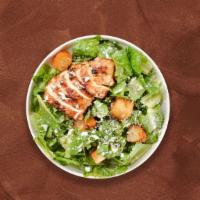 Classic Chicken Caesar Salad · Romaine lettuce, grilled chicken, house croutons, and parmesan cheese tossed with caesar dre...