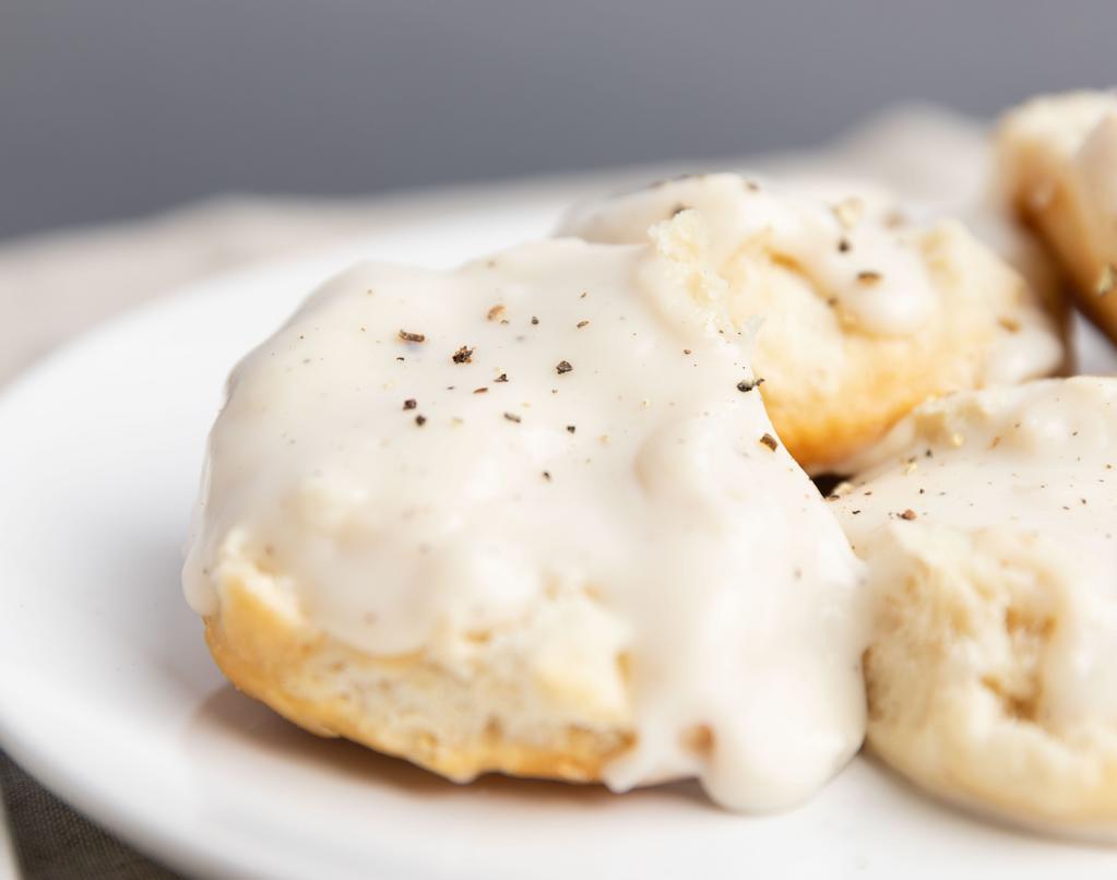 Biscuits And Gravy · 500 Cal. Two buttermilk biscuits served open-faced and smothered in our traditional white gravy.