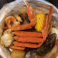 B1 · Mussel 1/2 LB, Shrimp(no head) 1/2LB, Snow Crab 1/2LB

Includes: 2 Sweet Corn, 2 Red Potatoe...