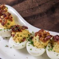 Buck'S Deviled Eggs · Sweet pickle relish topped with hickory smoked bacon.