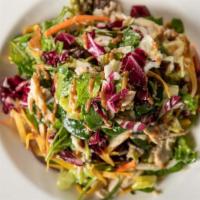 Grilled Chicken Salad · House greens, honey-chili vinaigrette with a touch of thai peanut sauce.