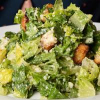 Caesar Salad · Fresh romaine, reggiano and sourdough croutons.