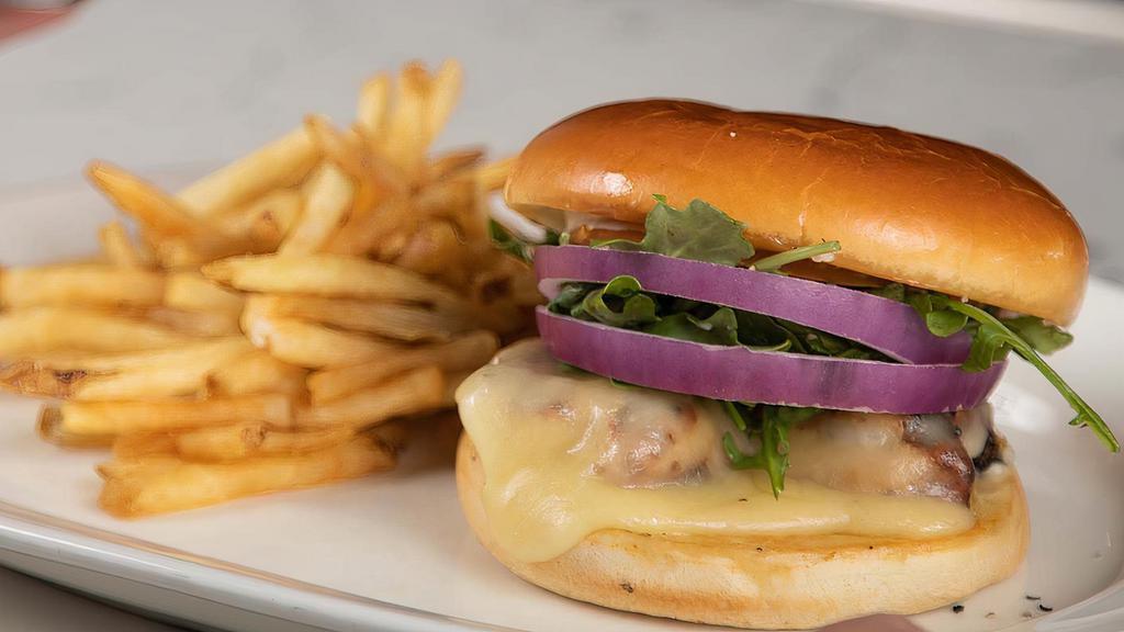 Grilled Chicken Sandwich · Marinated chicken breast with melted Monterey jack, mayo, tomato, onions, and arugula. Comes with a side of French Fries.