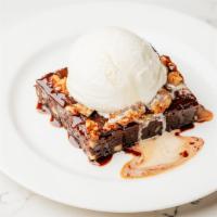 Walnut Brownie A La Mode · Warm, dark chocolate brownie, walnuts, vanilla ice cream