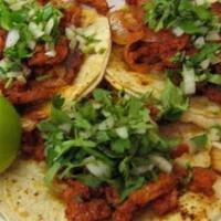 Tacos Supreme (1) · Choice of meat prepared with onions, cilantro, lettuce, cheese, and tomatoes.