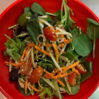 House Salad · spring mix, carrots, cucumber and tomato. . Topped with peanuts, fried shallots and house ma...