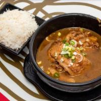 Caramelized Claypot Catfish · catfish in a caramelized pepper sauce with pineapples. Served with steamed jasmine rice. Med...