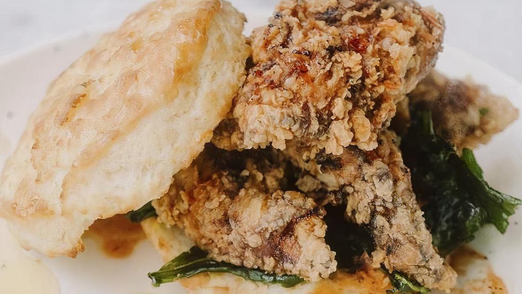 Sweet Tea Brined Chicken & Biscuits · Sweet Tea Brined Tenders, Buttermilk Biscuits, Crispy Greens, House Hot Sauce, Honey. Served with House Chips