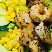 Cajun Shrimp Salad · Blackened shrimp, romaine, tomato, avocado, cucumbers, roasted corn, red onion, served with ...
