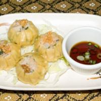 Steamed Dumpling · Popular item. Four pieces.