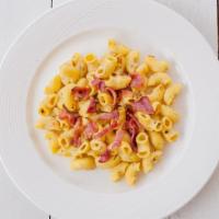Bacon Mac And Cheese · Delicious and Fresh Penne Pasta, Alfredo Sauce, Bacon, Cheddar, Parmesan Cheese.