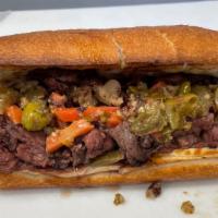 Chicago Style Italian Beef Sandwich · Chicago Style Italian Beef Marinated and Slow Cooked. Shaved, dipped in au jus on Sliced Pro...