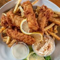 Fish And Chips · Beer battered and fried Atlantic cod with house cut fries, slaw, tartar, and lemon.
