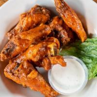 Wings · Serves 3. With your choices of dressing and two wing sauces. Served with celery. Choice of R...