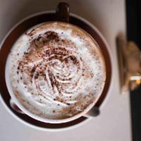 Dark Mocha · Espresso, Monin chocolate sauce, steamed milk & whipped cream lightly dusted with cocoa powd...