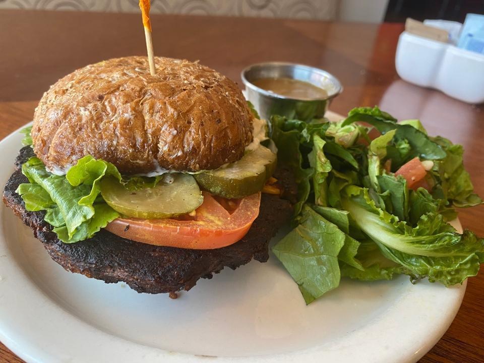 Vegan Burger · Morning star vegan black bean patty, lettuce,tomato,pickles,mustard and vegenaise on a vegan wheat bun.