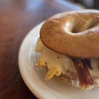 Bec Bagel · Local Dave's Bagels plain bagel with 2 scrambled eggs, provolone cheese and Marmilu farms ba...