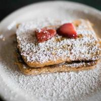 Stuffed French Toast · Two slices of house made ciabatta french toast stuffed with NutellaTM & your. choice of stra...