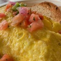 Inigo Montoya · Three egg omelet or scramble with grilled chicken, white cheddar, & pico de gallo.