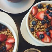 Granola Cereal & Milk · House vegan granola cereal & a cold side of the milk of your choice. Topped with seasonal fr...