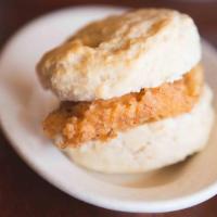 Chicken Biscuit · Hot fried chicken with our special breading sandwiched with a house made biscuit. Wonderful ...