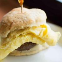 Sausage, Egg & Cheese Biscuit · House made biscuit with local Marmilu Farms sausage, cheddar and a folded perfectly scramble...