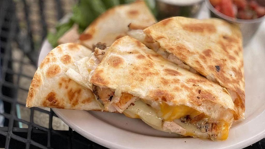 Chicken Quesadilla · Cheese quesadilla with grilled chicken, served with a side of pico de gallo & sour cream.