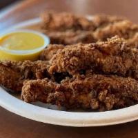 Chicken Strips · Chicken strips, grilled or fried, with your choice of house made dipping sauce: Honey Mustar...