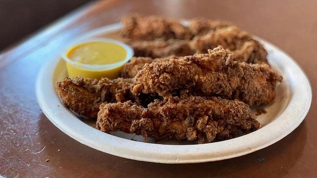 Chicken Strips · Chicken strips, grilled or fried, with your choice of house made dipping sauce: Honey Mustard, or Ranch.
