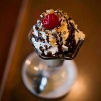 The Cafe Sundae · A classic soda fountain sundae with two scoops of your choice of Chocolate, Strawberry, Mint...