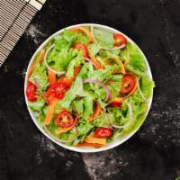 Family Dinner Salad · A perfect compliment to our gourmet pizzas. Tossed salad with fresh ingredients including fr...