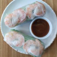 Shrimp Summer Roll (2 Rolls) · Two rolls of shrimps, vermicelli noodles, lettuce, cilantro and mint wrapped neatly in rice ...