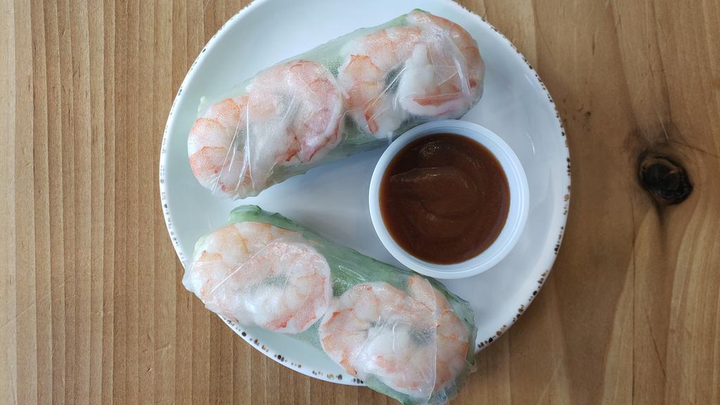 Shrimp Summer Roll (2 Rolls) · Two rolls of shrimps, vermicelli noodles, lettuce, cilantro and mint wrapped neatly in rice paper with a side of peanut sauce.