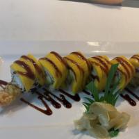 Loco Mango Roll · Avocado, crab, tempura shrimp topped with mango.